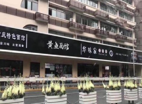 九龙坡区政府为什么要统一规划店铺招牌？